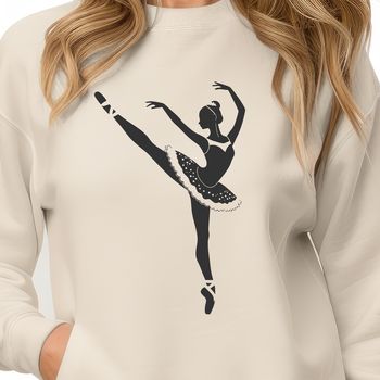 A young ballet dancer in a tutu posing in a dramatic pose.