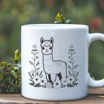 A cute, fluffy alpaca in a field with floral elements surrounding it.