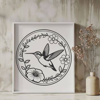 A colorful hummingbird perched on a floral arrangement, perfect for use in vector design projects.