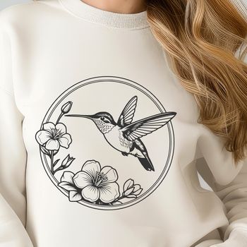 A detailed vector design of a hummingbird in flight, suitable for various uses such as crafting or graphic projects.