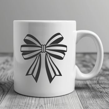 A simple, elegant bow with ribbon details, ideal for crafting and design projects.
