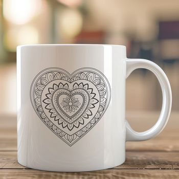 Vector design featuring an intricate mandala heart pattern with floral elements, suitable for cutting machine projects.