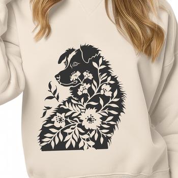 An Australian Shepherd dog in full body pose, sitting on a background with floral patterns.