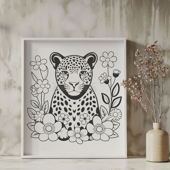 Close-up illustration of a big cat's face, with floral patterns in the background.