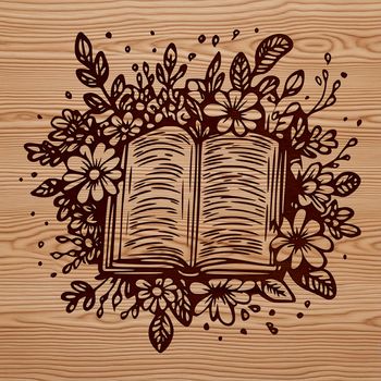 A simple vector illustration of an open book with floral details on the cover.