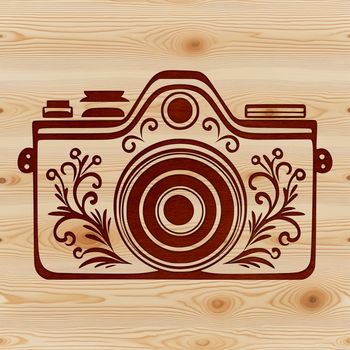 A digital camera illustration with ornate details suitable for vector art.