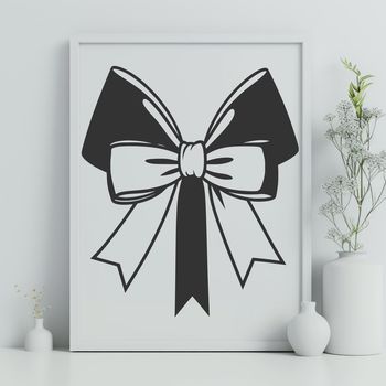 A simple bow design made with vector lines and curves, suitable for printing or digital use.