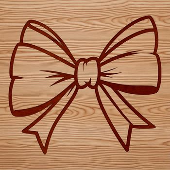 A decorative bow with ribbons tied in the middle.
