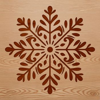 A delicate, intricately designed snowflake with symmetrical patterns and sharp edges.