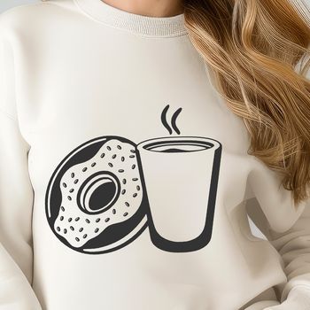 A colorful illustration of a single serving-sized donut on a white coffee cup.