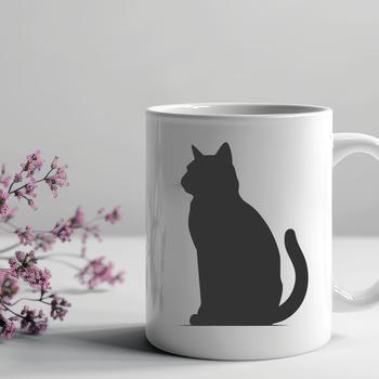 A black silhouette of a cat sitting in a relaxed pose.