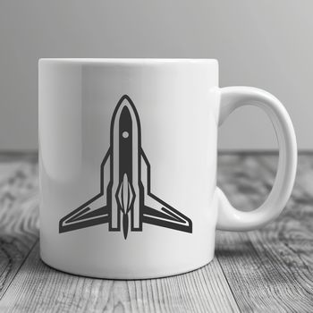 A stylized 2D illustration of a spaceship in space.
