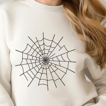 Free reusable graphic design element featuring an intricate spider web design.