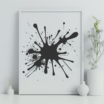A stylized illustration of a colorful splat shape with messy, uneven edges.