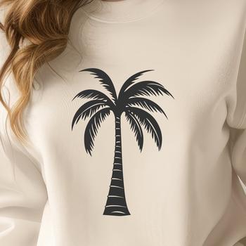 A single palm tree standing on a sandy beach with a clear blue sky in the background.