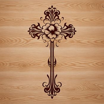 Ornate cross with floral elements in a traditional crucifix design.