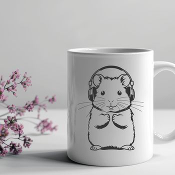 A small, furry animal with rounded ears and a long tail, commonly kept as a pet.