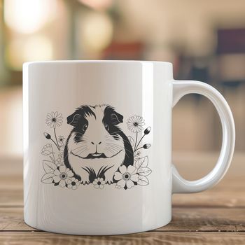 A cute illustration of a guinea pig surrounded by floral patterns.