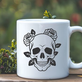 A stylized skull design featuring a rose motif, suitable for crafting and design projects.