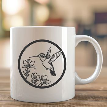 A detailed vector design of a hummingbird in flight among flowers.