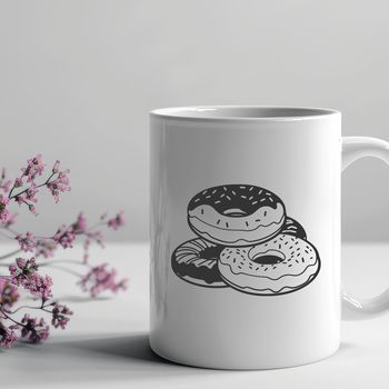 A stylized illustration of a sugary donut, suitable for digital design.
