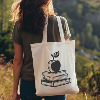 A digital illustration of an open book with the Apple logo, suitable for educational resources.