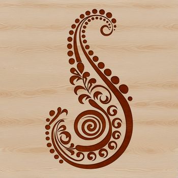 A stylized ornate paisley pattern with intricate shapes and details.