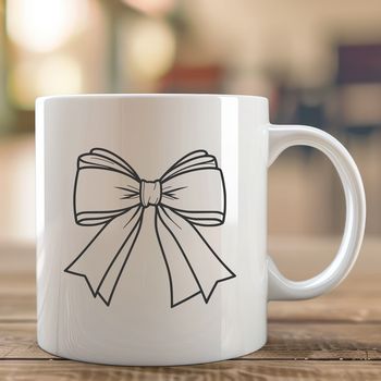 A colorful bow made of intertwined loops and ribbons, ideal for decorating gifts or crafting projects.