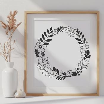 A floral design featuring a circular wreath shape with intricate details.