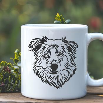 A portrait of a dog with a distinctive coat pattern and herding breed characteristics.