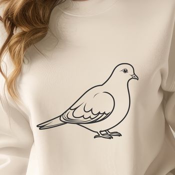 A white dove with spread wings perched on a branch.