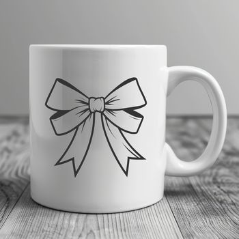 A decorative bow made with ribbons and flowers, suitable for gift wrapping or decorating a present.