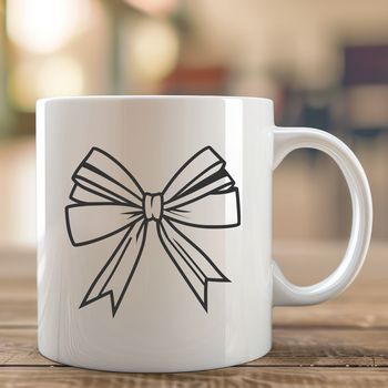 A decorative ribbon bow with curved ends and a centered knot, suitable for gift wrapping or crafting.