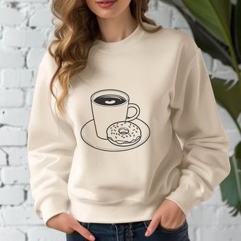 A simple illustration of a donut on a coffee cup.