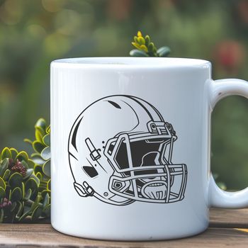 A football helmet with a strap and face mask, commonly used in American Football.