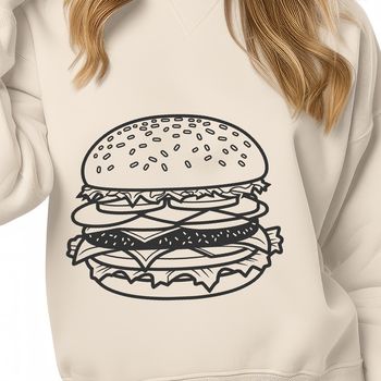 A simple illustration of a classic hamburger with a round bun and a patty topped with lettuce and cheese.