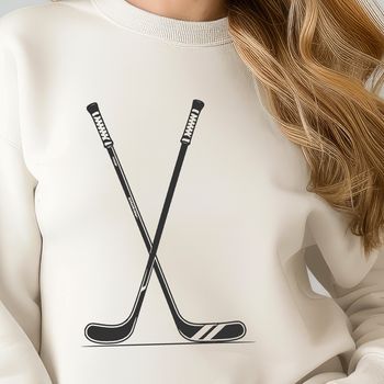 A detailed vector illustration of a hockey stick and puck, suitable for various design projects.