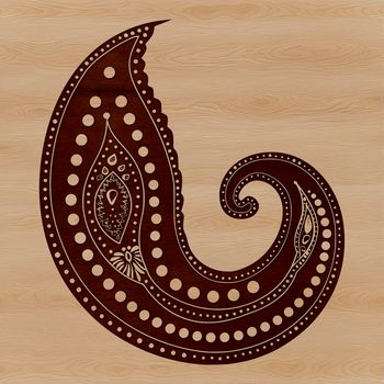 A detailed paisley motif with intricate curves and patterns.