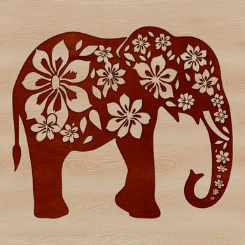 A standing elephant with intricate ornate floral patterns.