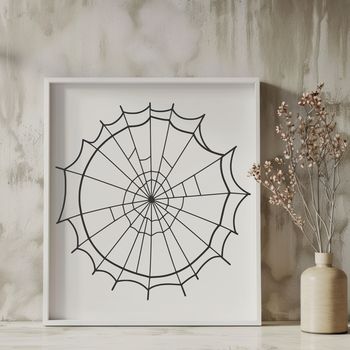 A geometric pattern made up of interconnected lines, resembling the intricate design of a spider web.