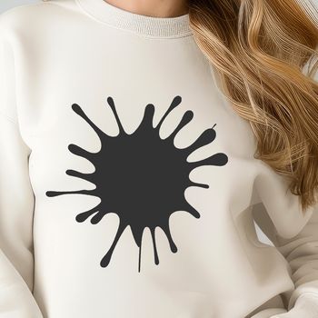 Illustration of a splat, a messy circular shape with irregular edges.