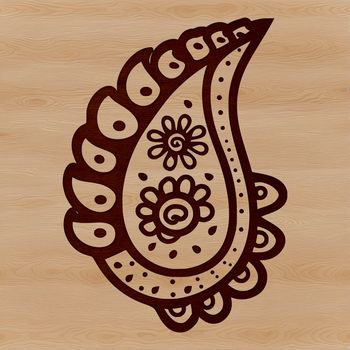 A traditional ornate paisley motif with intricate patterns and shapes.