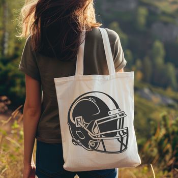 Vector illustration of a football helmet with laces and facemask, suitable for sport and athletic designs.