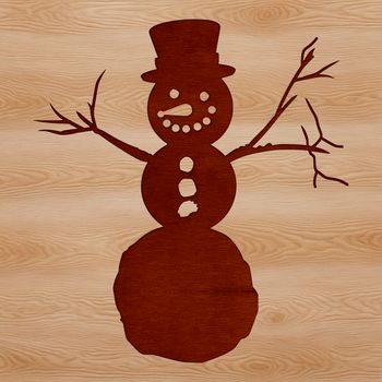 A winter season snowman made from stacked blocks of snow.