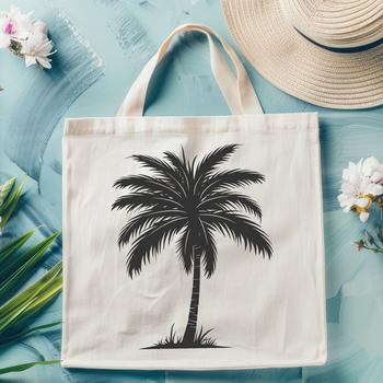 A pair of tall palm trees with swaying fronds standing in sandy soil.