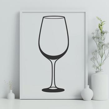A glass of red wine on a table with a white background.