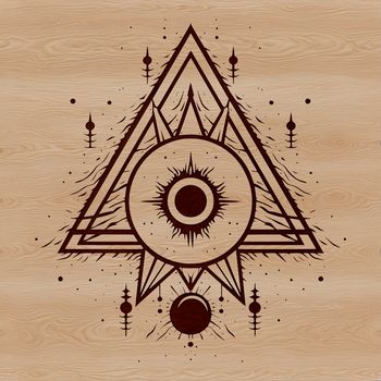 Ornate witchcraft design featuring a stylized eye symbol against a dark background.