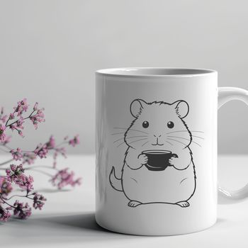 A small, furry hamster sitting in a tiny cup, suitable for use as clip art in various digital designs.