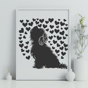 A sitting Havanese dog with hearts around it.