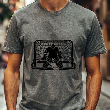 A silhouette of a hockey player in action on the ice, aiming at the goal.